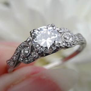 Art Deco diamond ring in platinum, .92ct transitional cut diamonds, assessment report, ring size O / 7.5 sizeable