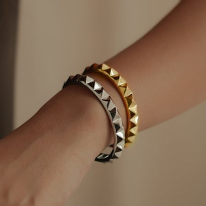 Gold spike bracelet top