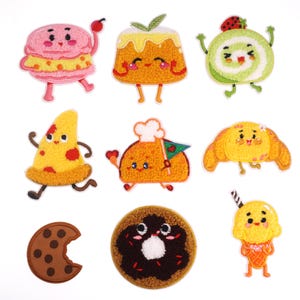 May include: Nine embroidered iron-on patches featuring various food items, including a pizza, donut, ice cream cone, cupcake, macaron, and a croissant. Each patch has a cute cartoon face and is designed in a colorful, whimsical style.