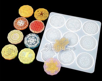 May include: A silicone mold with 12 circular cavities for making resin coasters. The mold features various geometric designs, including a hamsa hand, a flower of life, and a tree of life. There are also several finished resin coasters with different colors and designs.
