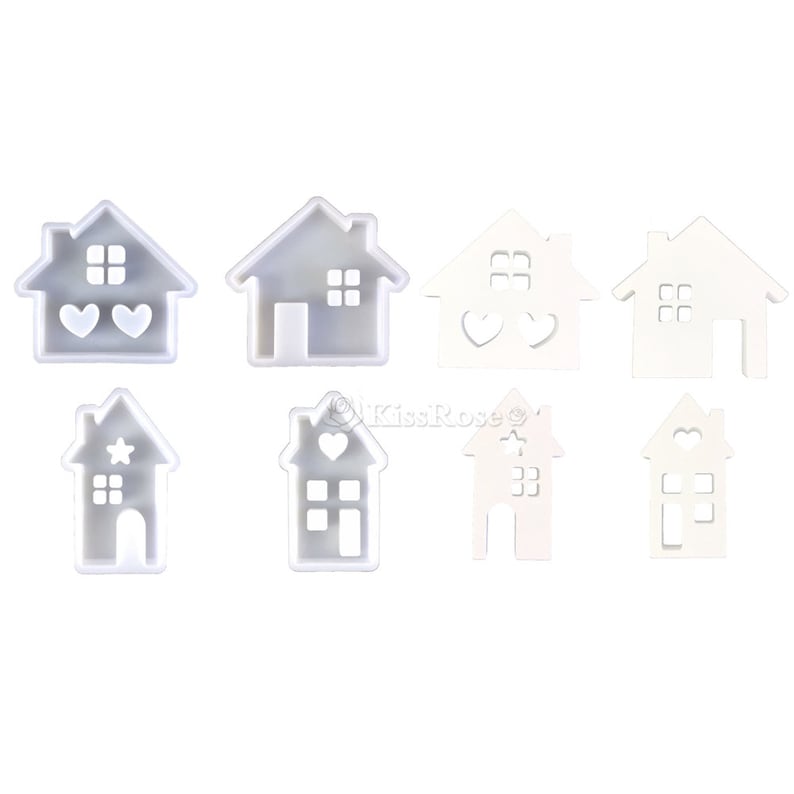 Pu&ograve; includere: Otto stampi in silicone bianco a forma di case con diversi design di finestre e porte. Alcune case hanno cuori, stelle o altri elementi decorativi.