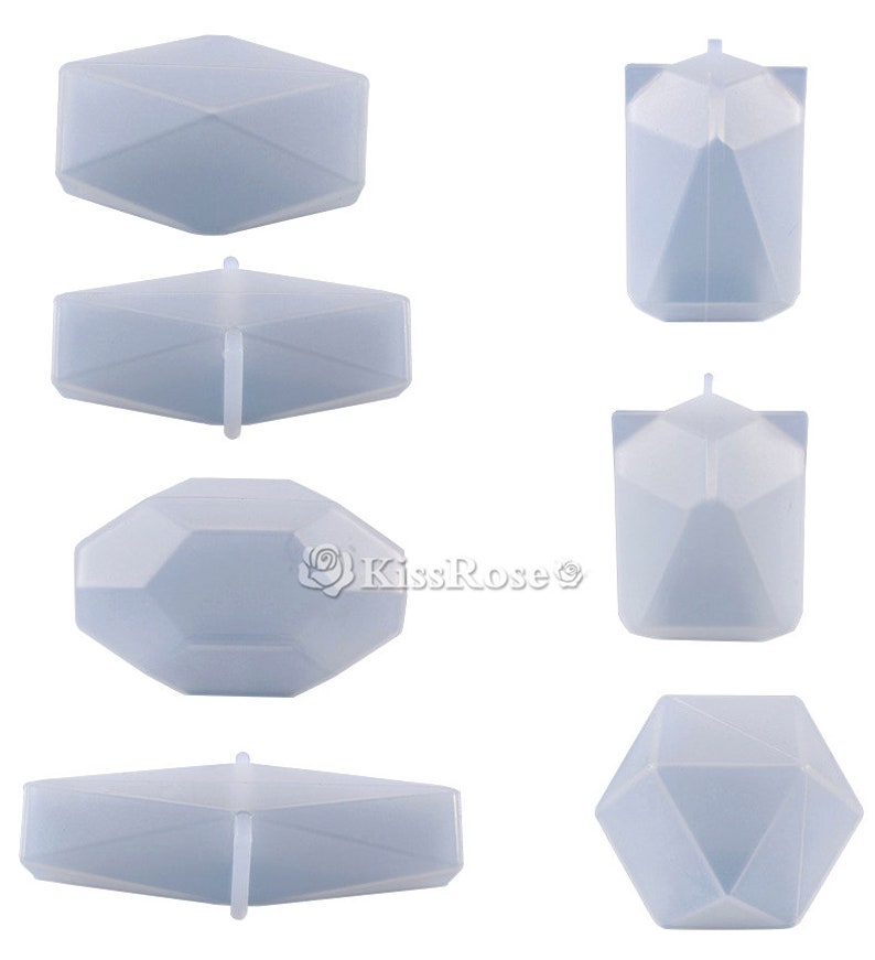 May include: Set of six clear silicone molds shaped like geometric diamonds. The molds are designed for making candles, soap, or resin crafts.