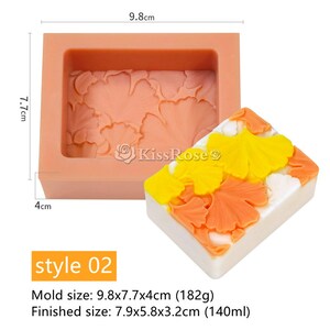 May include: A silicone mold for making soap bars with a ginkgo leaf design. The mold is pink and measures 9.8 by 7.7 by 4 centimeters. The finished soap bar measures 7.9 by 5.8 by 3.2 centimeters.