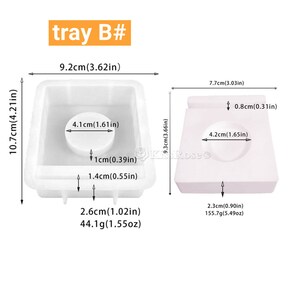 Puede incluir: Dos moldes de silicona blancos para hacer jab&oacute;n o manualidades de resina. El molde m&aacute;s grande mide 9,2 cm de ancho, 10,7 cm de alto y 3,7 cm de profundidad. El molde m&aacute;s peque&ntilde;o mide 7,7 cm de ancho, 9,3 cm de alto y 2,3 cm de profundidad. Ambos moldes tienen una hendidura circular en el centro.