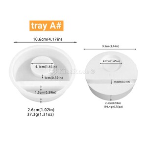May include: Two white silicone molds for making soap or resin crafts. The mold on the left is 4.1 inches in diameter and 1.5 inches deep. The mold on the right is 3.74 inches in diameter and 0.8 inches deep. Both molds have a small rectangular cutout on the side.