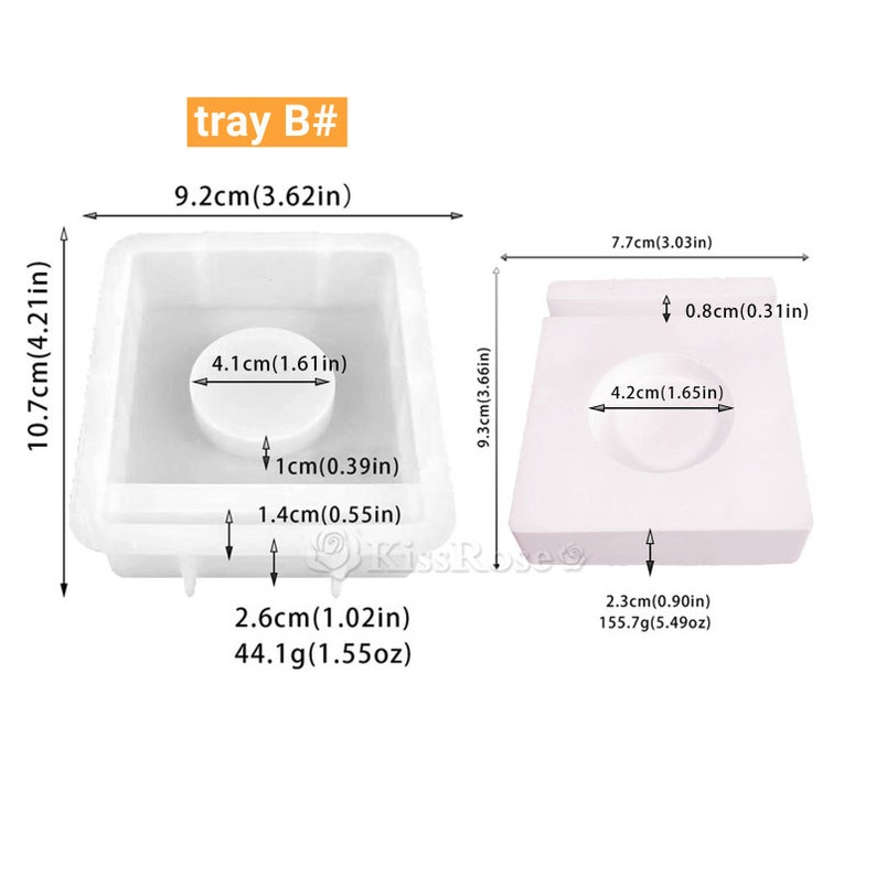 May include: Two white silicone molds for making soap or resin crafts. The mold on the left is a square with a round indentation in the center. The mold on the right is a square with a round indentation in the center. The mold on the left is 9.2 cm wide, 10.7 cm tall, and 2.6 cm deep. The mold on the right is 7.7 cm wide, 9.3 cm tall, and 2.3 cm deep.