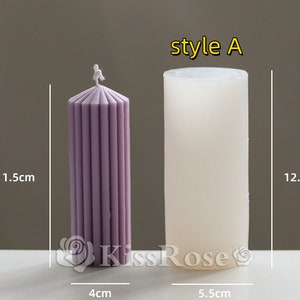 May include: Two candle molds, style A. The mold on the left is 11.5 inches tall and 4 inches wide. The mold on the right is 12.3 inches tall and 5.5 inches wide.