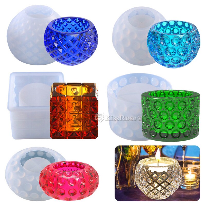 May include: Set of silicone molds for making candle holders. The molds are in the shape of a sphere, a cube, and a cylinder. The molds are shown with finished candle holders in blue, green, red, and orange.