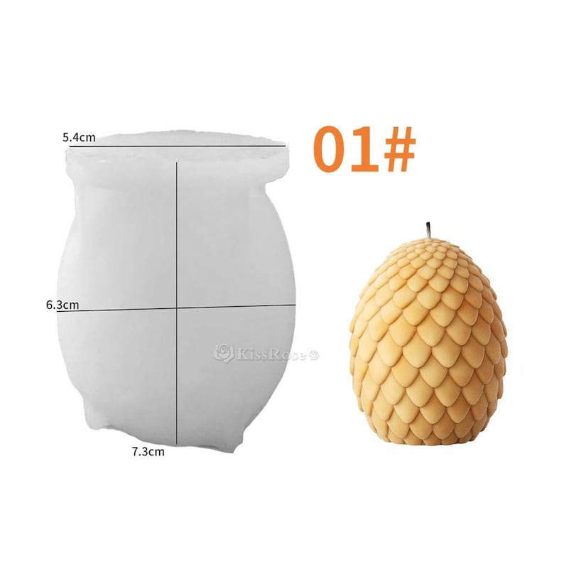 May include: A white silicone mold for making a candle shaped like a dragon egg. The mold is 7.3 cm wide, 6.3 cm tall, and 5.4 cm in diameter. The mold is shown next to a finished candle, which is a light brown color and has a textured surface.