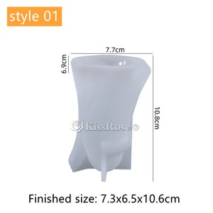 May include: White silicone mold for making a vase. The mold is 7.7 inches wide, 6.9 inches tall, and 10.8 inches deep. The finished vase will be 7.3 inches wide, 6.5 inches tall, and 10.6 inches deep.