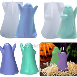 May include: Set of four ghost-shaped silicone molds for making candles. The molds are shown with finished candles in blue, green, and purple.