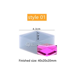 May include: A clear silicone mold for making a geometric resin piece. The mold is 4.3 cm wide and 2.3 cm tall. The finished piece will be 40x20x20 mm. The mold is shown with a pink resin piece inside.