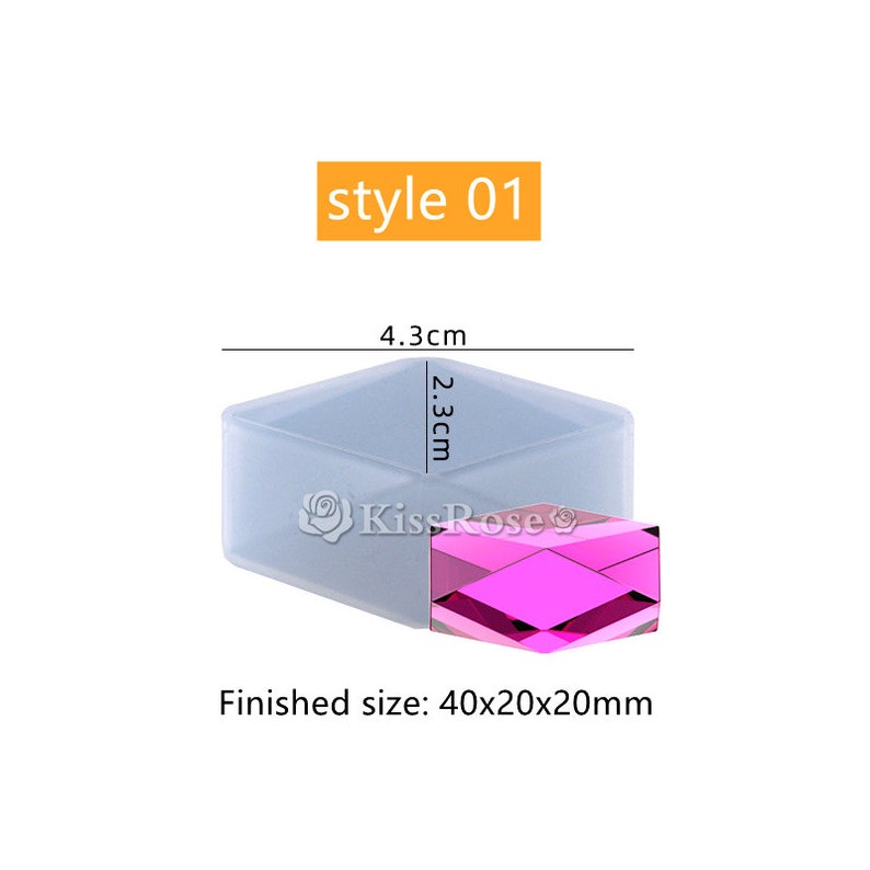 May include: A clear silicone mold for making a geometric resin piece. The mold is 4.3 cm wide and 2.3 cm tall. The finished piece will be 40x20x20 mm. The mold is shown with a pink resin piece inside.