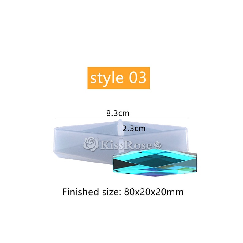 May include: A clear silicone mold for making a faceted, geometric, teal-colored resin pendant. The mold is 8.3 cm long and 2.3 cm wide. The finished pendant will be 80 mm x 20 mm x 20 mm.