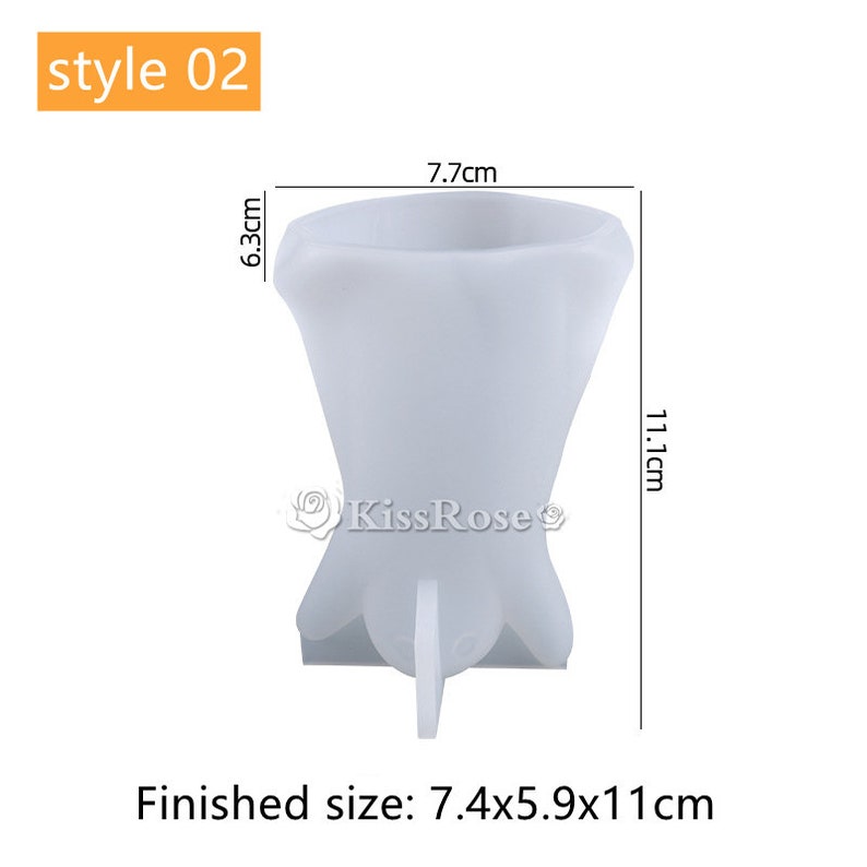 May include: White silicone mold for making a flower-shaped vase. The mold is 7.7 cm wide, 6.3 cm tall, and 11.1 cm deep. The finished vase will be 7.4 cm wide, 5.9 cm tall, and 11 cm deep.