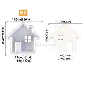 Pu&ograve; includere: Due stampi in silicone bianco a forma di case. Lo stampo a sinistra misura 14,2 cm di larghezza, 13,2 cm di altezza e 2,1 cm di profondit&agrave;. Lo stampo a destra misura 13,2 cm di larghezza, 12,1 cm di altezza e 2 cm di profondit&agrave;.