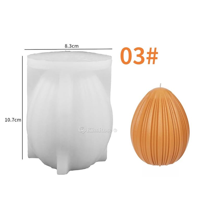 May include: A white silicone mold for making candles in the shape of an egg with vertical ridges. The mold is 8.3 cm wide and 10.7 cm tall. A finished candle is shown in orange with the same shape and ridges. The text "03#" is also shown in the image.