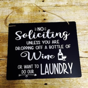 No Soliciting unless you are dropping off a bottle of wine or want to do our laundry- funny no soliciting sign