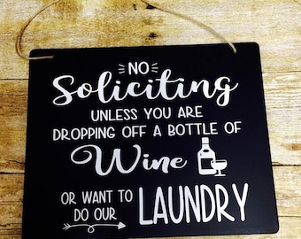 No Soliciting unless you are dropping off a bottle of wine or want to do our laundry- funny no soliciting sign