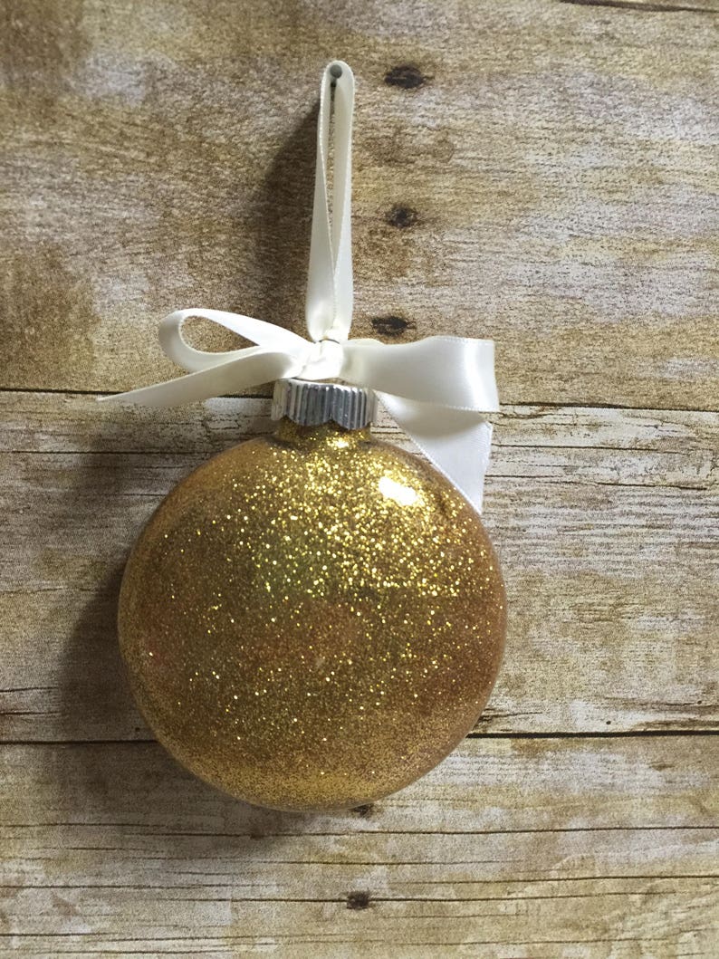 Because someone we love is in Heaven there/'s a little bit of Heaven in our home Christmas Ornament Memorial Ornament