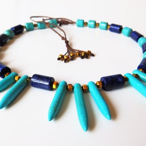 Necklace of natural stones. Bluish turquoise, Lapis lazuli and golden Hematite spacers. Completion of macramé.