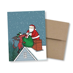Tarjeta navideña de Nueva Jersey: el diablo de Jersey con Papá Noel. Tarjeta navideña de Pine Barrens, Nueva Jersey. Tarjeta navideña divertida. Críptido lindo.