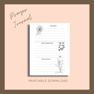 May include: A printable prayer journal with a light pink background and a brown border. The journal features lined pages with floral and heart illustrations. Text includes "Prayer Journal", "Prayer Requests", and "Printable Download".