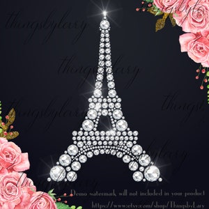 May include: A sparkling silver Eiffel Tower design made of rhinestones on a black background. The design is surrounded by pink roses and greenery.
