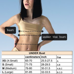May include: A size chart for tops, featuring bust and underbust measurements in inches and centimeters. The chart includes sizes XS to XXL, with corresponding cup sizes. Text at the bottom advises to provide bust volume if cup size is unknown.