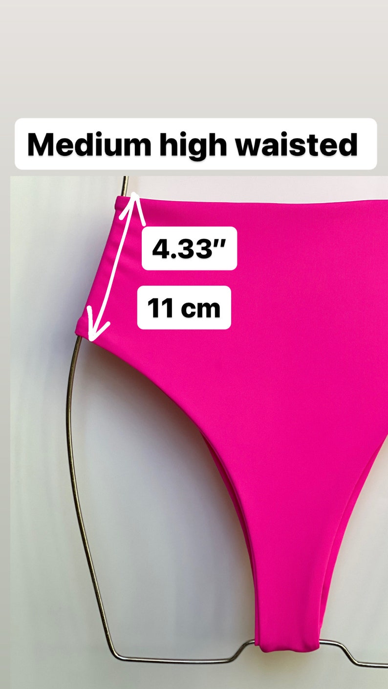 May include: Bright pink high-waisted bikini bottoms. The waist measures 4.33 inches (11 cm) high. The text "Medium high waisted" is displayed above the bikini bottoms.