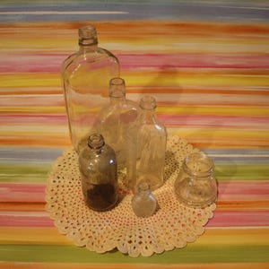 SALE! Lot of Six Bottles of Varying Sizes Clear Glass Bayer Company Half Pint Whiskey Bottle Unmarked Collectibles Vintage Bottles