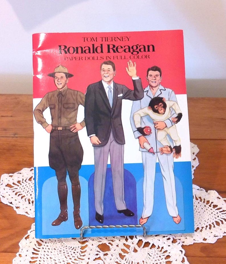 May include: A set of three ceramic mugs with a speckled, matte finish. The mugs are in shades of cream, light brown, and dark brown. Each mug has a simple, minimalist design and a rounded handle.