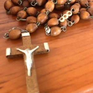 brown wooden rosary the back of the crucifix is jerusalem vintage