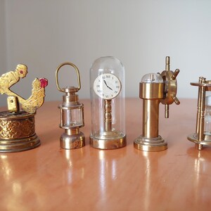 Vintage Brass Nautical Miniatures Lot: Hourglass, Lantern, Ship Wheel, Tape Measure