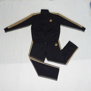 Adidas tracksuit mens black and gold on sale