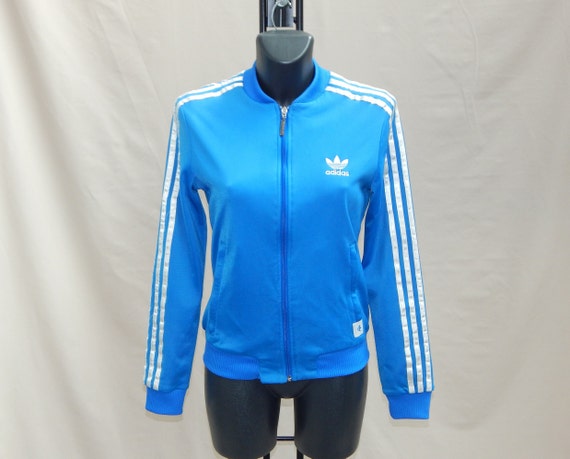 Baby blue adidas tracksuit womens hotsell