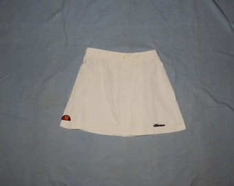 Faldas de tenis para adultos Ellesse Vintage 80s blancas Made in Italy. Tamaño de etiqueta IT44, 10 UK/US, blanco