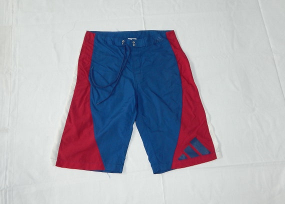 Adidas franja roja y azul sale