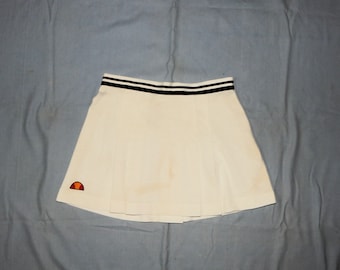 Ellesse, jupes blanches de tennis pour adultes vintage des années 80, fabriquées en Italie. Taille d'étiquette : 48, D 44, Royaume-Uni/États-Unis : 14, blanc, bleu