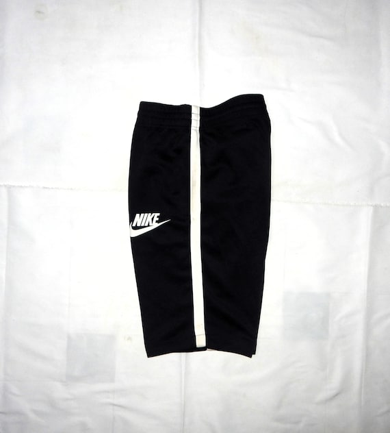 nike black shorts white stripe