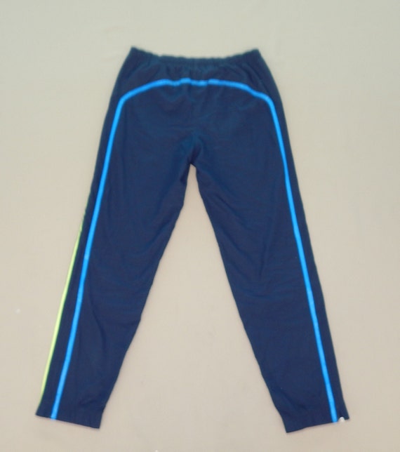 Lacoste Vintage 90s Adults' Windbreaker Tracksuit Pants. Label Size: 2. Navy Blue/White