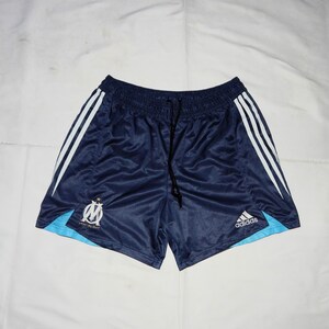 Pantalones cortos vintage Adidas del Olympique de Marsella, equipo de fútbol oficial, raros, de la década de 2000, talla 34 en el Reino Unido, talla M en EE. UU., azul/transparente
