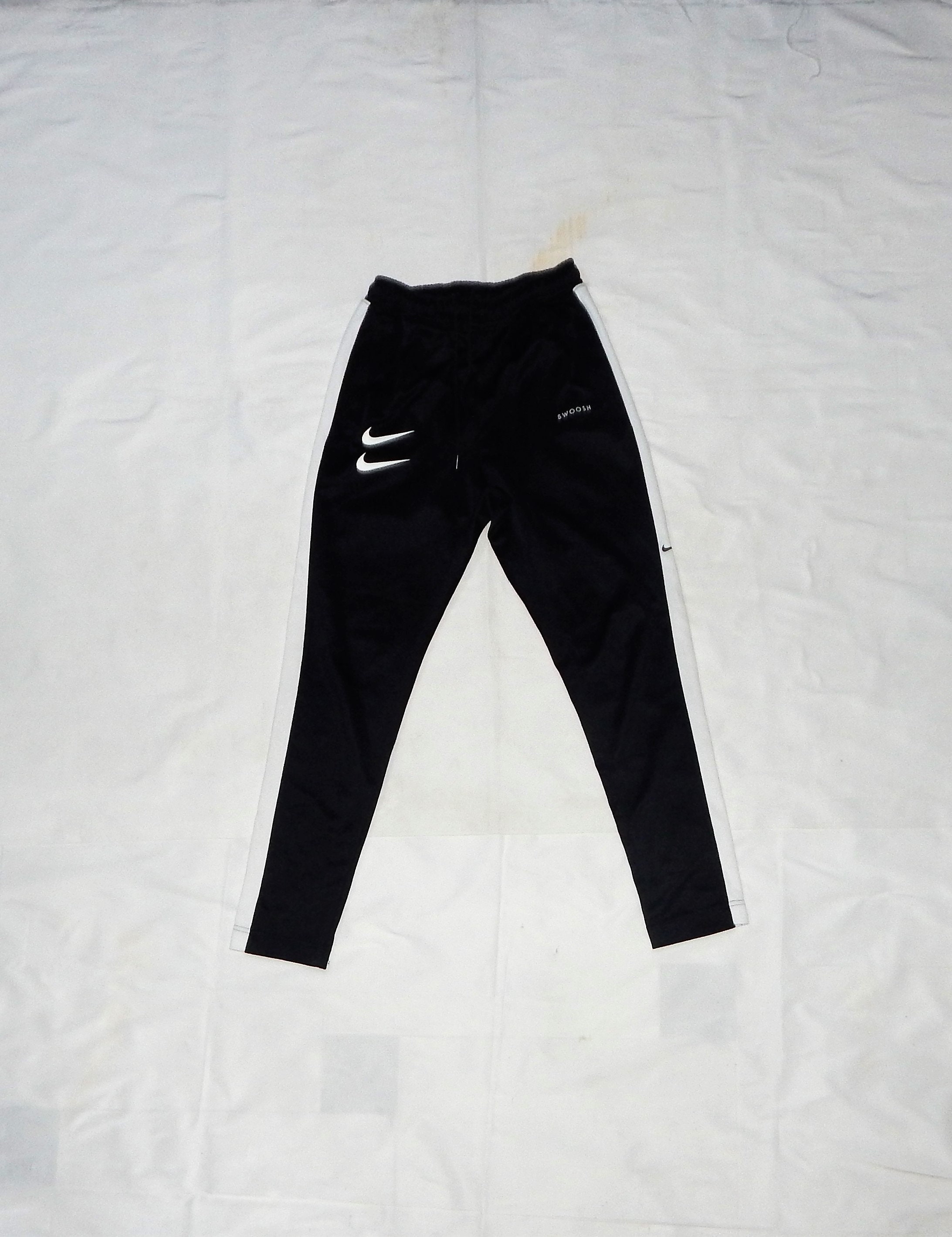 nike swoosh joggers black and white