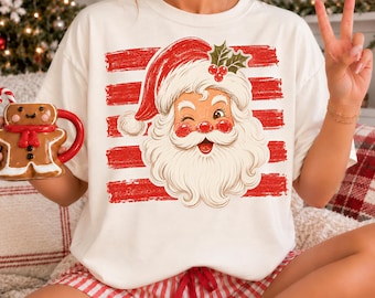 Comfort Colors® Santa Sweatshirt, Winking Santa Claus Christmas Shirt, Retro Red Striped Holiday Tee, Vintage Xmas Gift for Women 001929