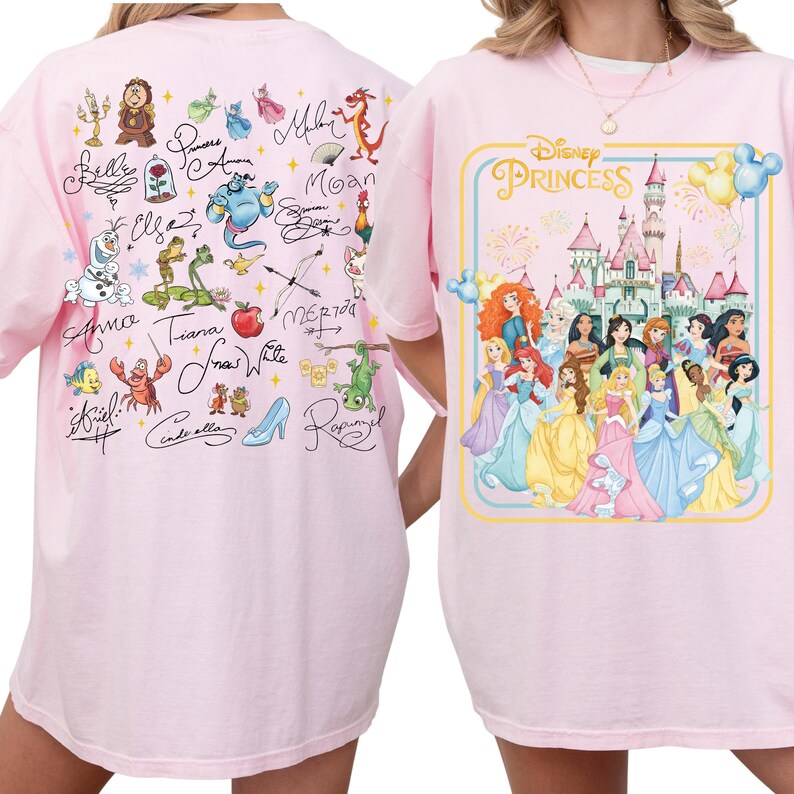 two pink t-shirts with Disney Princess characters on them. The t-shirt on the left has various Disney characters and text, while the t-shirt on the right has a Disney Princess-themed design.