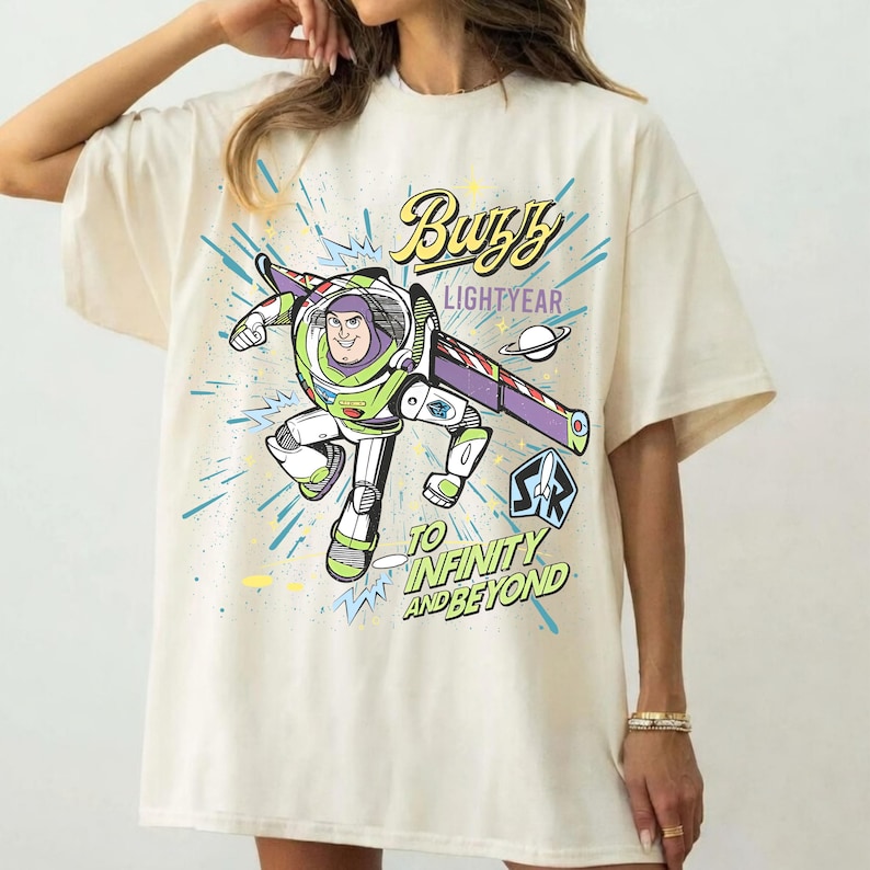 A white t-shirt with a colorful graphic design featuring a character from the animated film Toy Story.