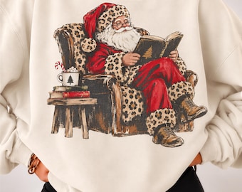Comfort Colors® Reading Santa Shirt, Leopard Print Christmas Tee, Bookish Holiday Top, Book Lover Xmas Gift for Women 001937