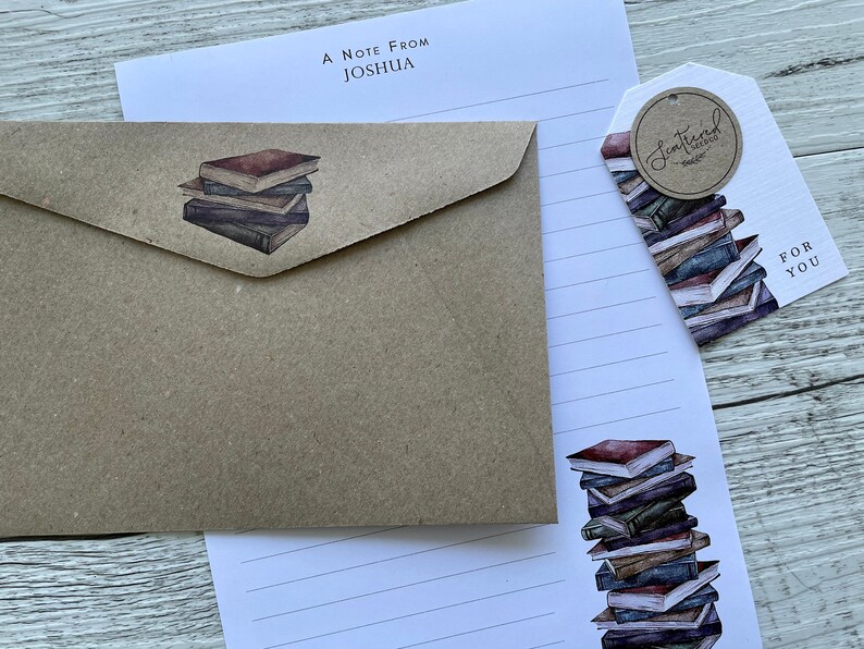 May include: A brown envelope with a stack of books illustration. A white lined sheet of paper with a stack of books illustration and the text "Sentimental" and "For You".