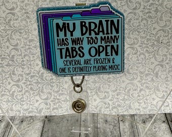 My brain has too many tabs open interchangeable badge reels