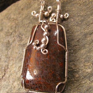 Dinosaur Bone and Sterling Silver Pendant